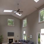 Tall living room with pairs of skylight panels overhead
