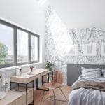 Minimalist white bedroom with three black-framed windows